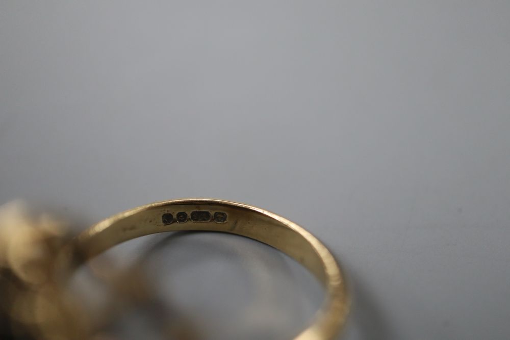 A modern 9ct gold and sapphire cluster dress ring, size M, gross 5.2 grams.